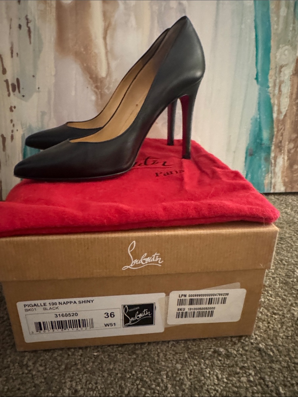 Christian Louboutin Black Pointed-Toe Stiletto Pumps with Signature Red Soles
